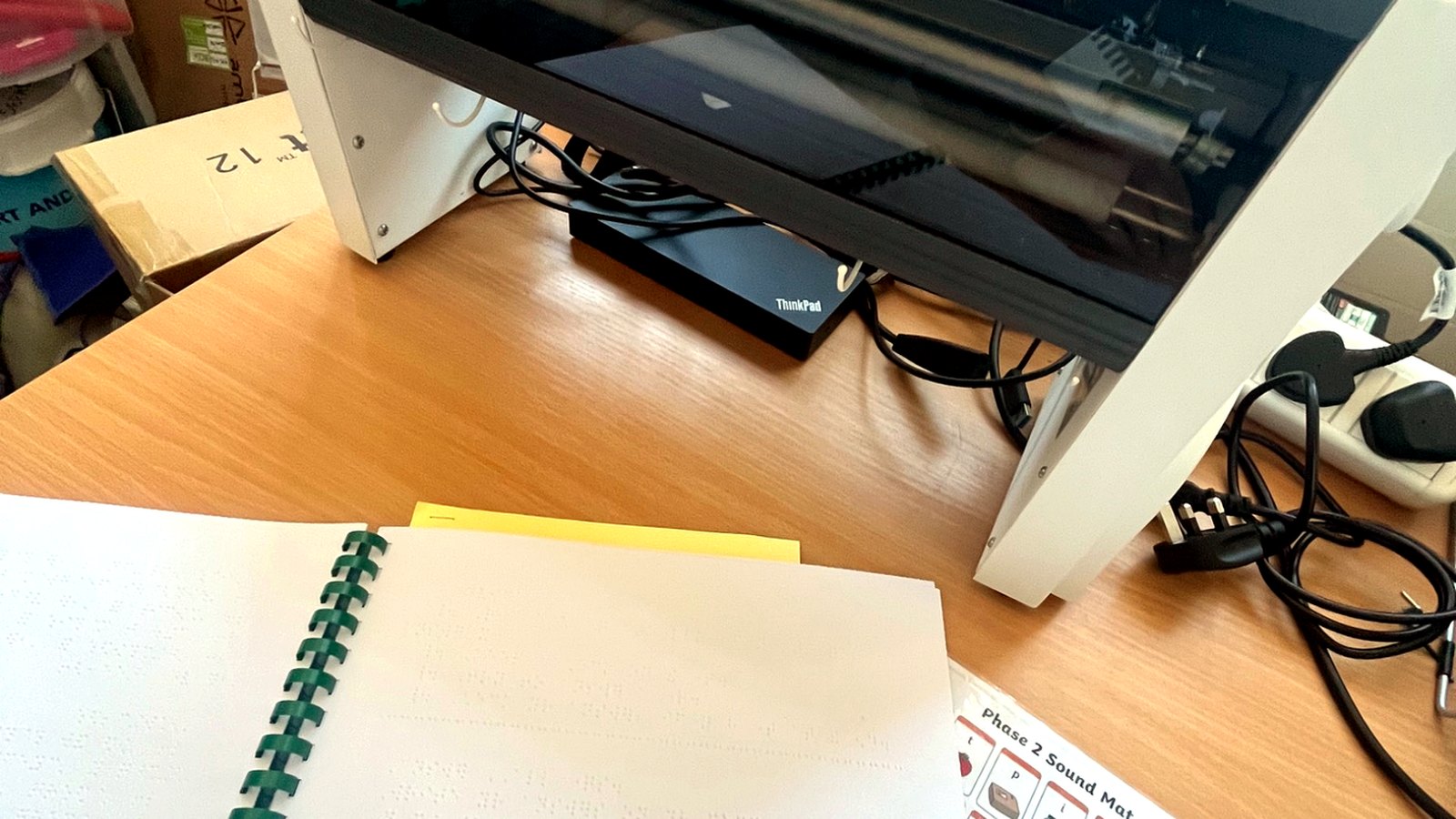 A learner using accessible technology in a classroom setting